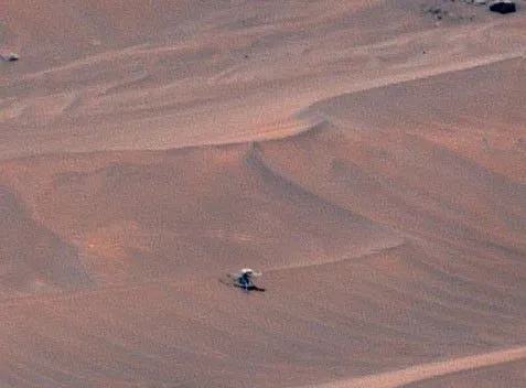 NASA's Ingenuity helicopter at its final resting place, Valinor Hills, photographed by Perseverance